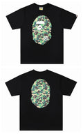 Bape T-shirt in black with camo ape face graphic on front