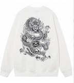 Stussy white crewneck sweatshirt with black dragon graphic on front