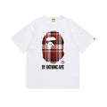 White graphic T-shirt with plaid ape face and "BY BATHING APE" logo