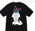 Black T-shirt with floral vase front graphic