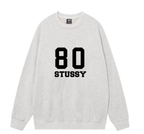Light gray crewneck sweatshirt with '80 STUSSY' front graphic