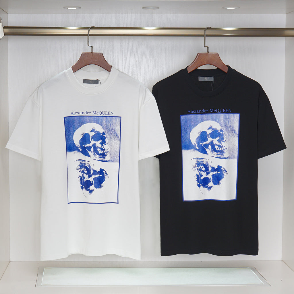 Alexander McQueen T-shirt pair: white and black, blue skull graphic on front