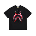 Black crewneck T-shirt with colorful graphic Bape-style face print
