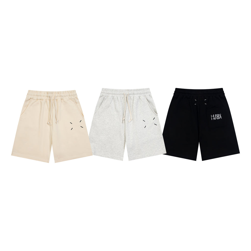 Shorts in beige, light gray, and black with drawstring and side seam pockets