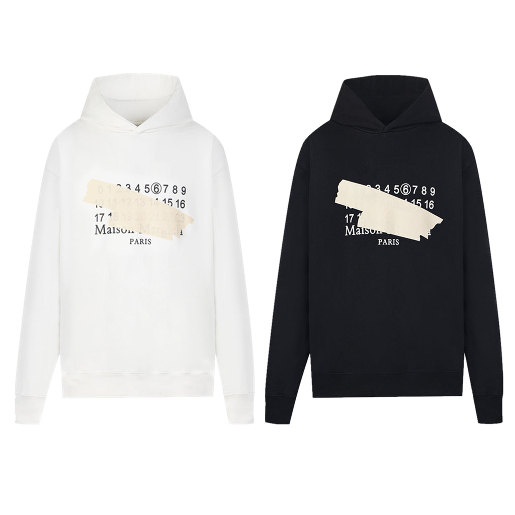 Maison Margiela hoodies, white and dark, number graphic across chest