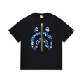 Bape black T-shirt with blue camo ape graphic and gold center print