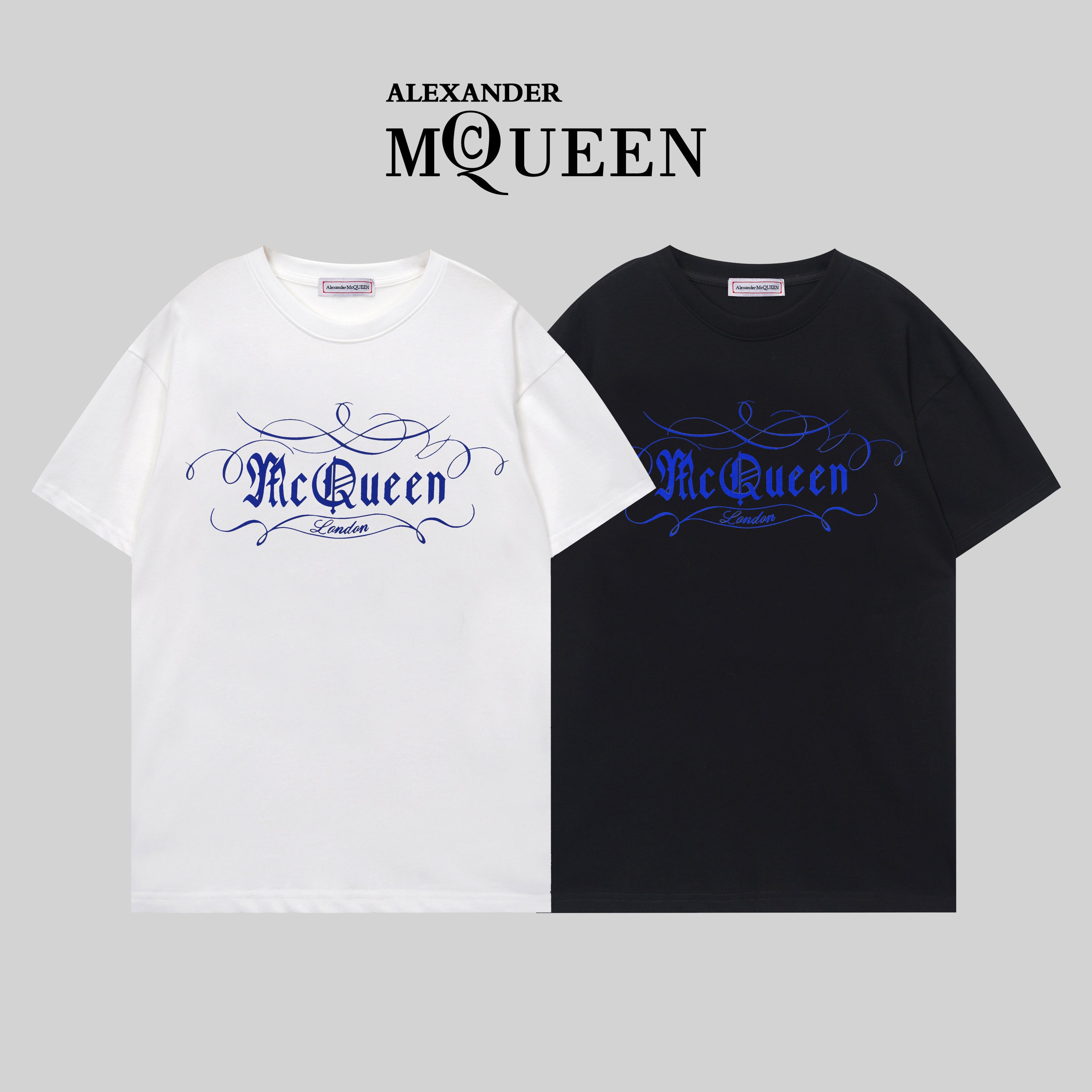 Two Alexander McQueen T-shirts, white/black, blue McQueen logo front