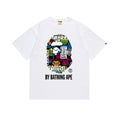 White T-shirt with colorful Bape ape face graphic and text BY BATHING APE