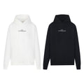 Pullover hoodie in white and black, with drawstring hood and long sleeves
