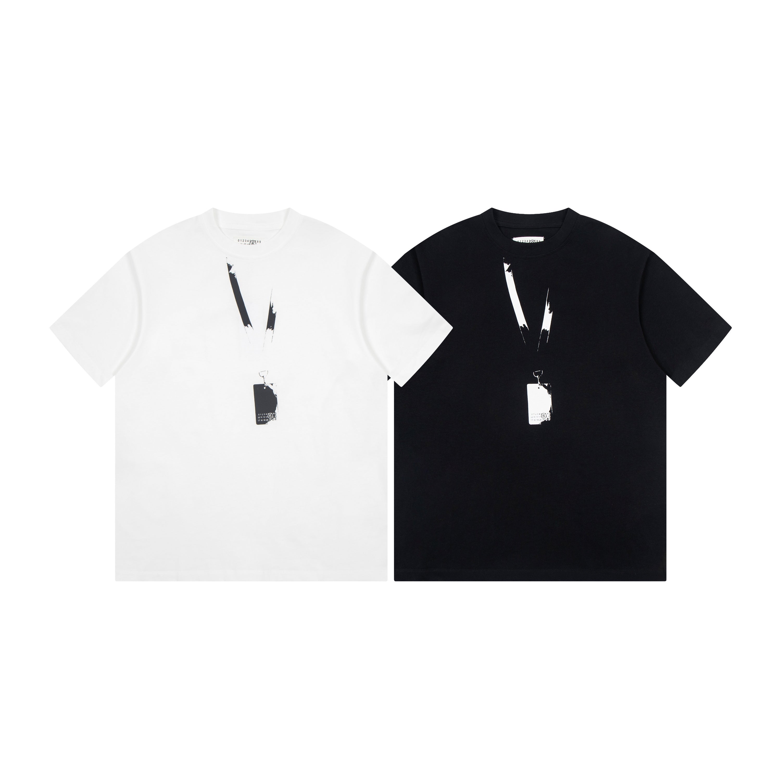 Pair of Maison Margiela T-shirts, one white and one black, with abstract graphic