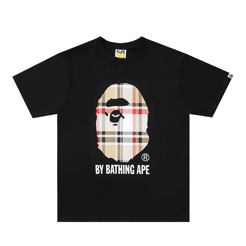 Black Bape T-shirt with front portrait graphic and BY BATHING APE text