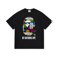 Black t-shirt with multicolor face graphic and BY BATHING APE text