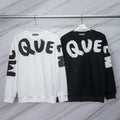 Pair of Alexander McQueen logo sweatshirts, white and black with bold lettering