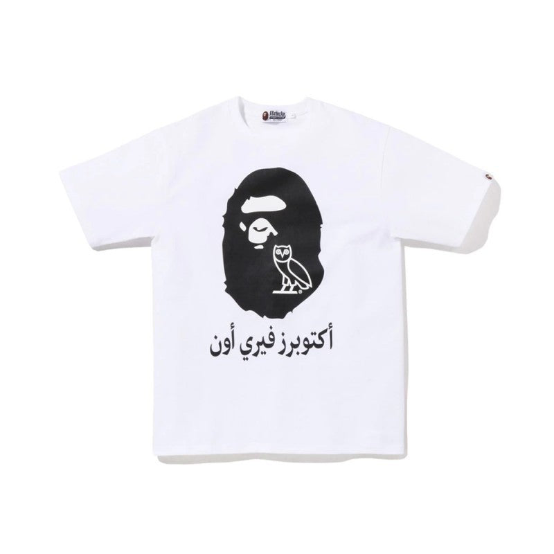 Bape white T-shirt with black graphic face and Arabic-style text