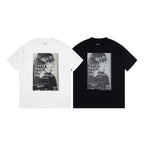 Two T-shirts, white and black, with square graphic print and Maison Margiela