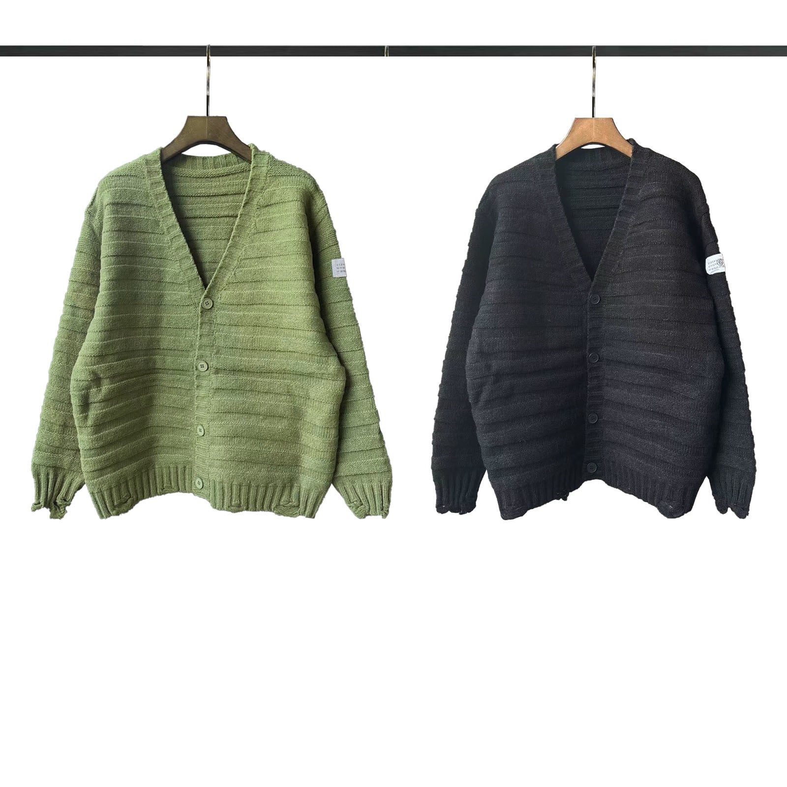 Maison Margiela green cardigan with V-neck, button front, and ribbed knit texture