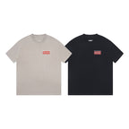Two short-sleeve T-shirts: light beige and black, each with chest logo print
