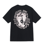 Black T-shirt with circular face graphic and multicolor word text