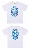 White T-shirt with blue camo face graphic on the front