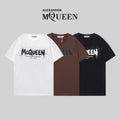 T-shirt trio with McQueen graphic logos, white, brown, and black short sleeves