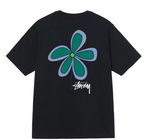 Stussy black T-shirt with green-blue flower graphic and Stussy logo