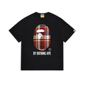 Black T-shirt with plaid ape graphic and BY BATHING APE text on chest