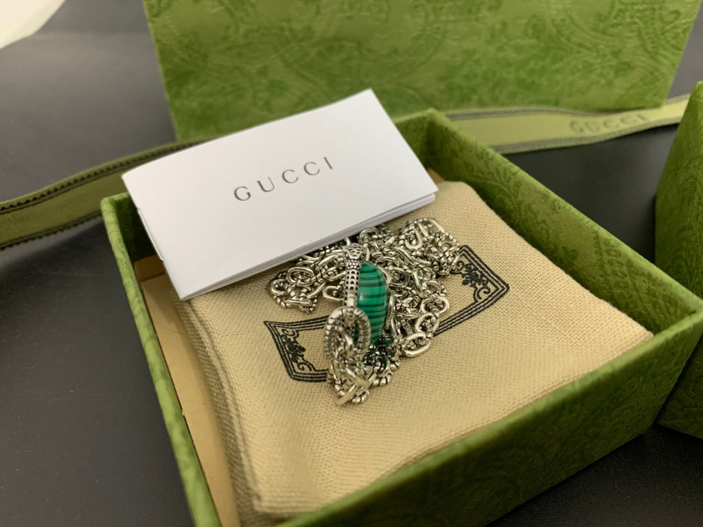 Gucci ornate silver pendant with green center medallion in display box
