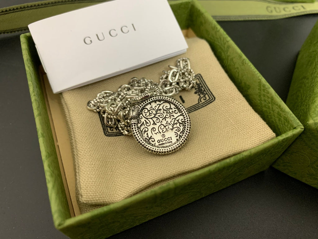 Gucci silver medallion charm pendant with ornate filigree