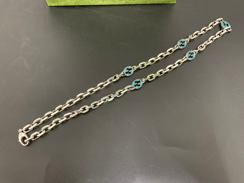 Silver chain strap with blue interlocking G links