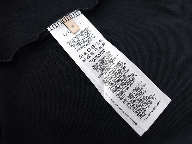 Navy T-shirt care label inside neckline
