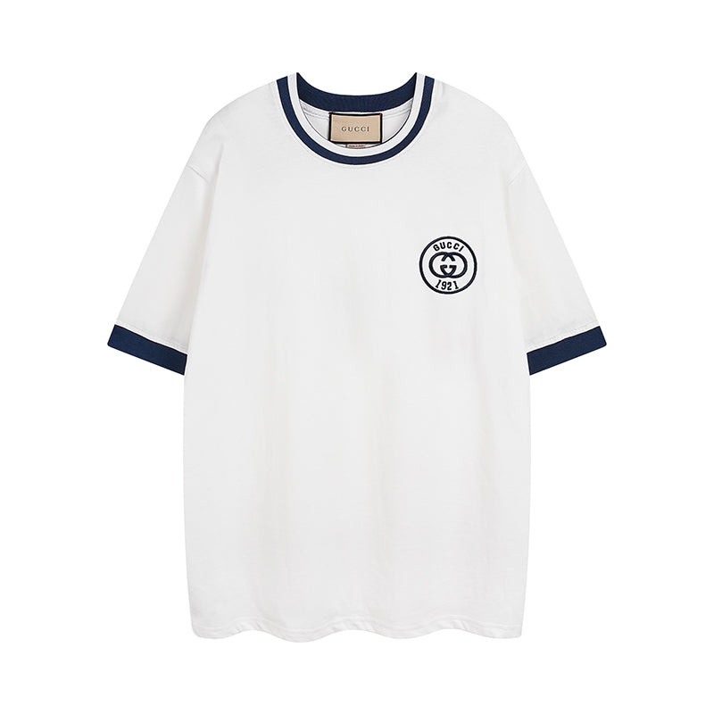 White short-sleeve T-shirt with navy collar and Gucci 1921 logo patch