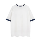 White short-sleeve T-shirt with navy trim sleeves and collar