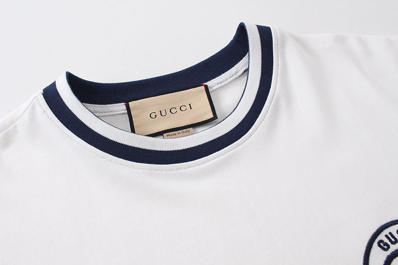 White short-sleeve T-shirt neckline with navy striped collar trim