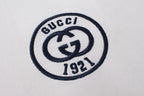 Gucci 1921 circular logo patch on white short-sleeve T-shirt