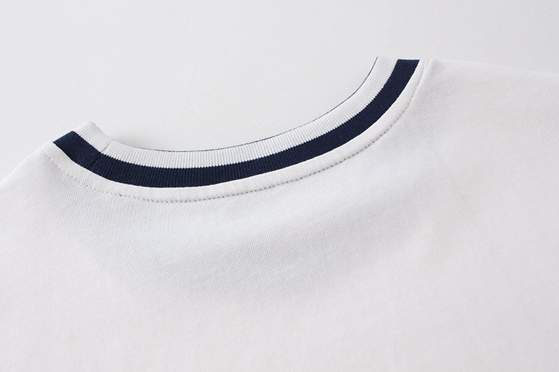 White T-shirt crew neck with navy ribbed trim
