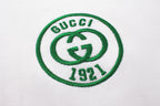 Gucci 1971 oval logo patch in green on white T-shirt