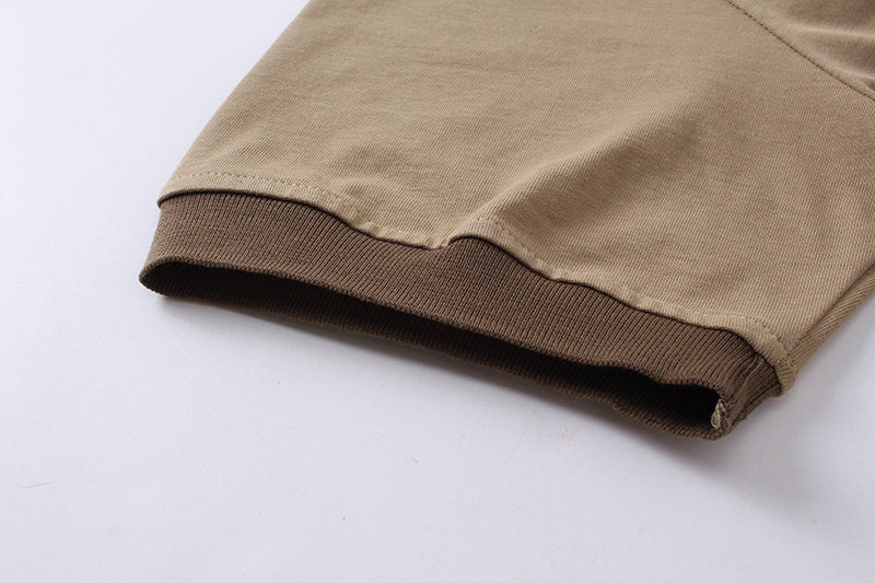 Tan T-shirt hem and short sleeve cuff in ribbed knit