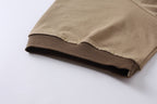 Tan T-shirt hem and short sleeve cuff in ribbed knit