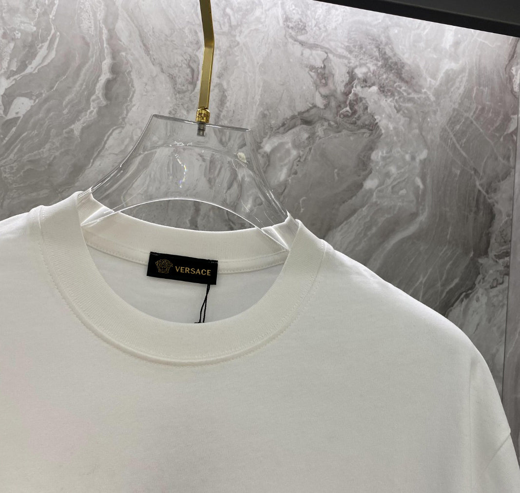 White T-shirt neckline close-up with inner brand label