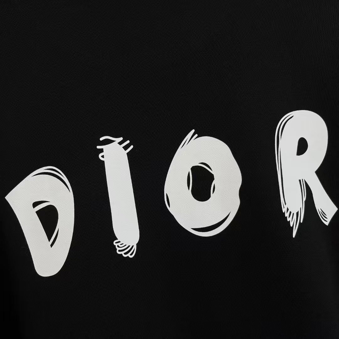 Black sweatshirt fabric with large white DIOR letter graphic across the front.