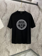 Versace black crewneck T-shirt with circular logo graphic on the front