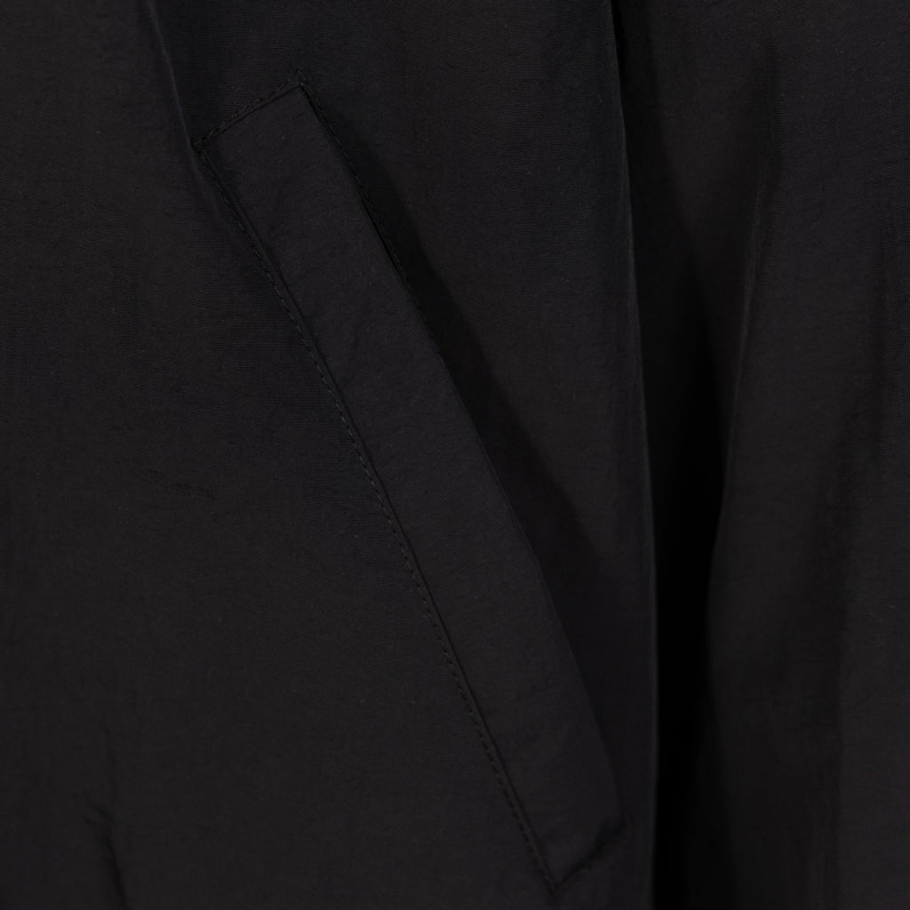 Black Balenciaga long jacket sleeve seam and diagonal stitch detail
