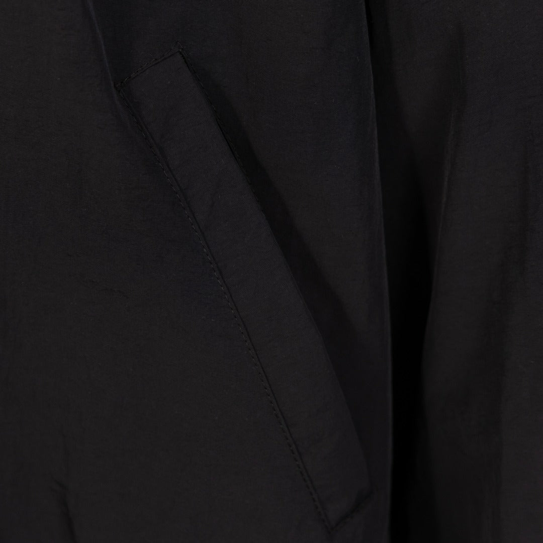 Black Balenciaga long jacket sleeve seam and diagonal stitch detail