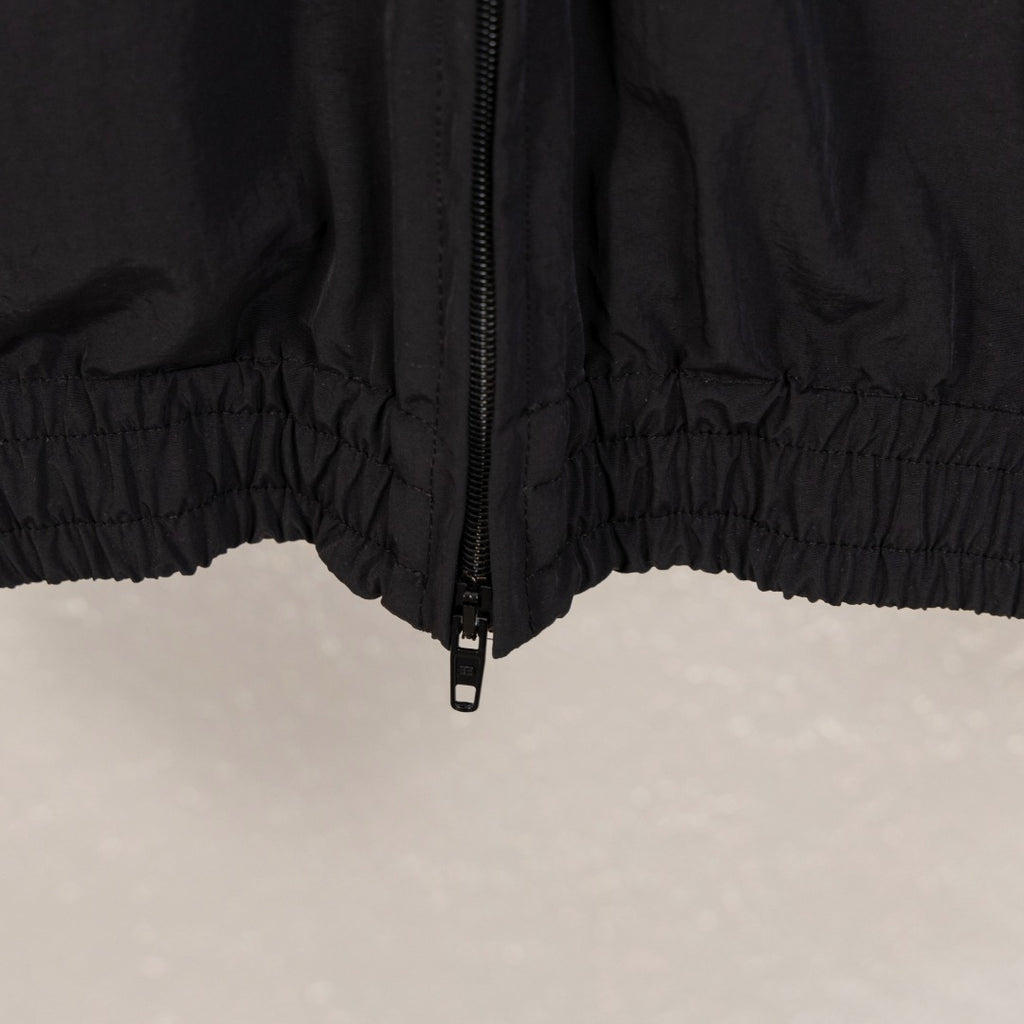 Black Balenciaga long jacket front zipper centered with elastic waist