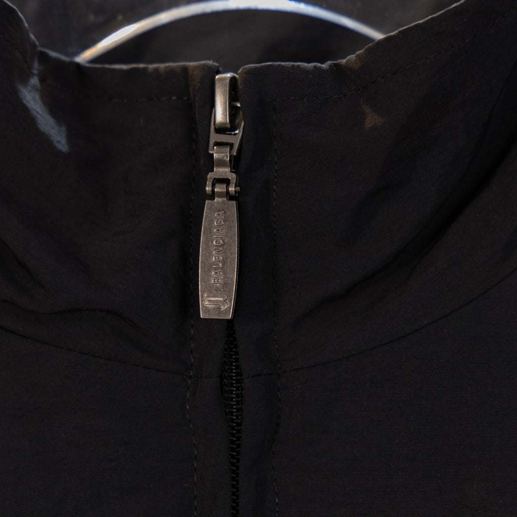 Black Balenciaga long jacket zipper pull and metal zipper detail
