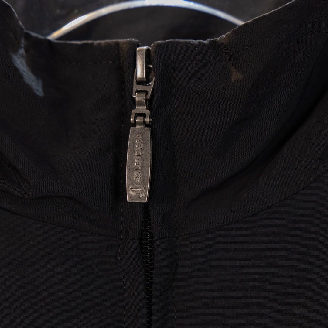 Black Balenciaga long jacket zipper pull and metal zipper detail