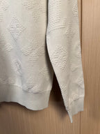 Cream long-sleeve sweater, ribbed cuffs, textured knit sleeves