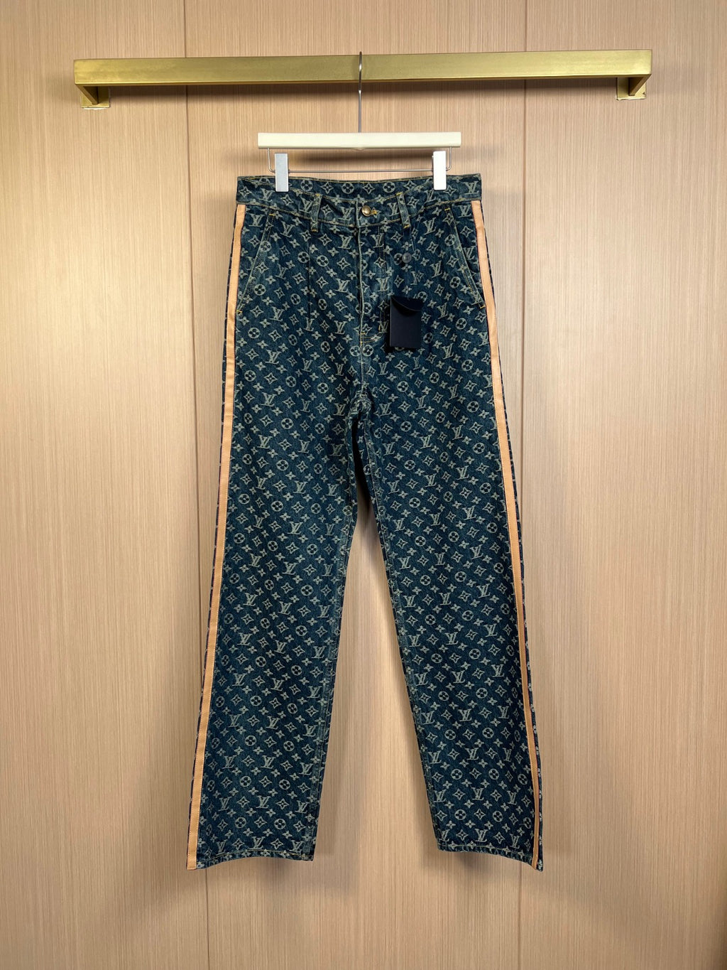 Louis Vuitton monogram denim pants, dark blue with gold-tone logo pattern