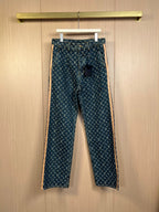 Louis Vuitton monogram denim pants, dark blue with gold-tone logo pattern