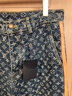 Louis Vuitton monogram denim pants, front button closure with hanging price tag